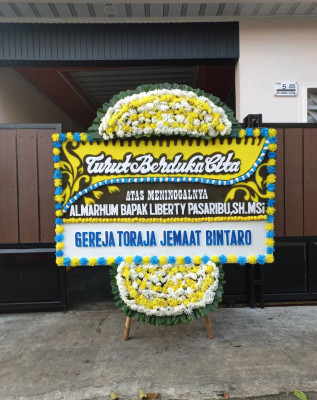 Papan Bunga Duka di Petukangan Utara